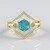 Anello in oro con Apatite Paraiba (Adela Gold)
