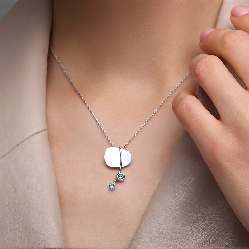 Colgante en plata con Topacio azul cielo (MONOSONO COLLECTION)