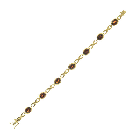 Brazalete en oro con Granate (CUSTODANA)