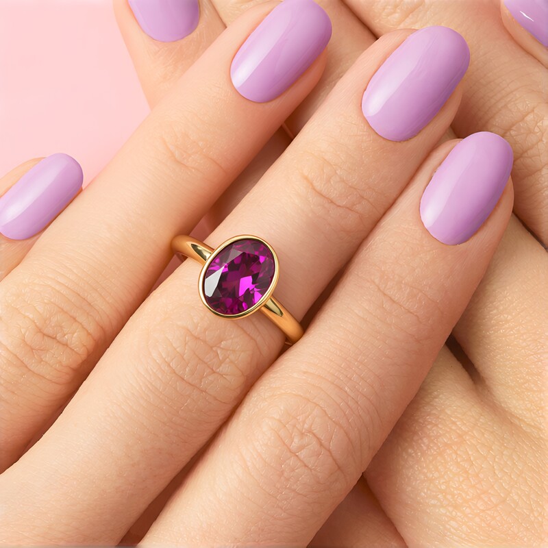 Anillo en oro con Zircón rojo (CUSTODANA)