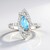 Bague en argent et Topaze bleu Suisse