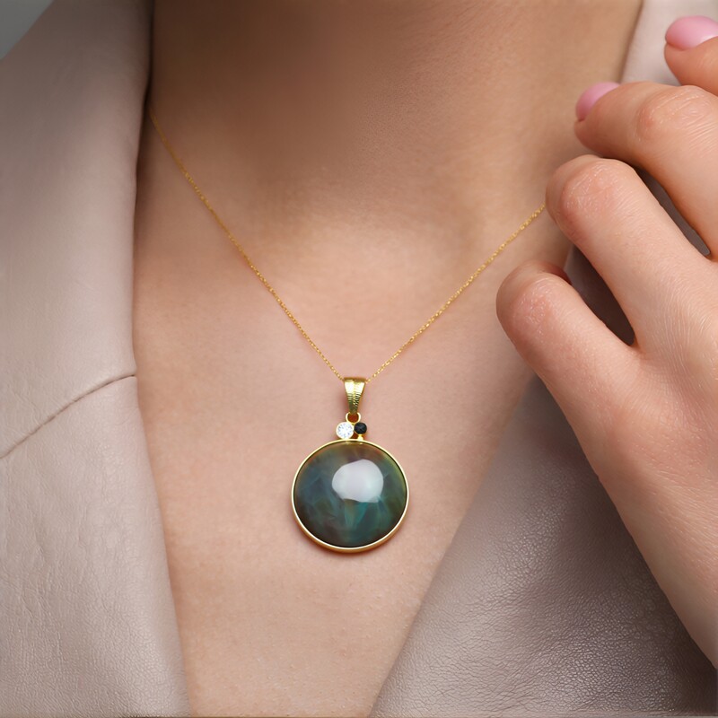 Pendentif en argent et Bois pétrifié opalisé (Bali Barong)