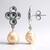 Boucles d'oreilles en argent et Perle de culture d'eau douce de couleur pêche (TPC)