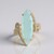 Anello in oro con Opale Paraiba (AMAYANI)