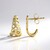 Boucles d'oreilles en or (Ornaments by de Melo)