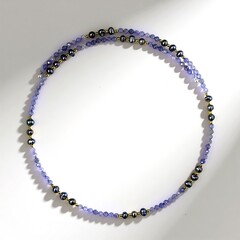 Collana rigida in acciaio con Tanzanite (Riya)
