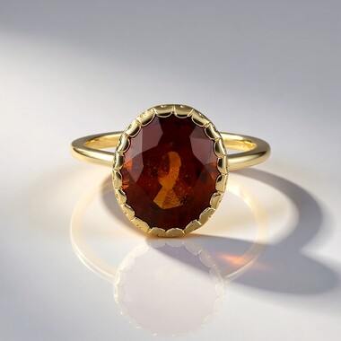 Anillo en oro con Granate Hesonita
