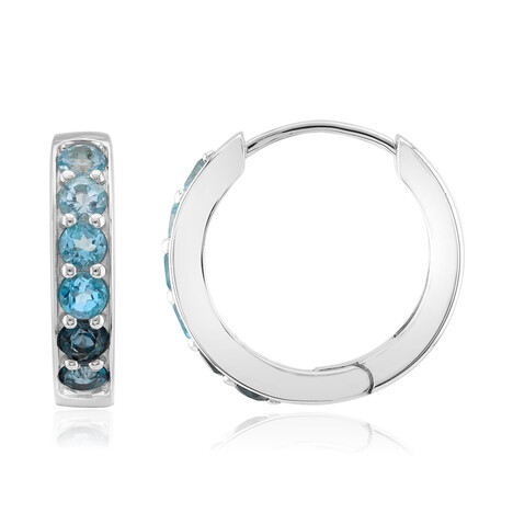 Zilveren oorbellen met hemel-blauwe topaasstenen