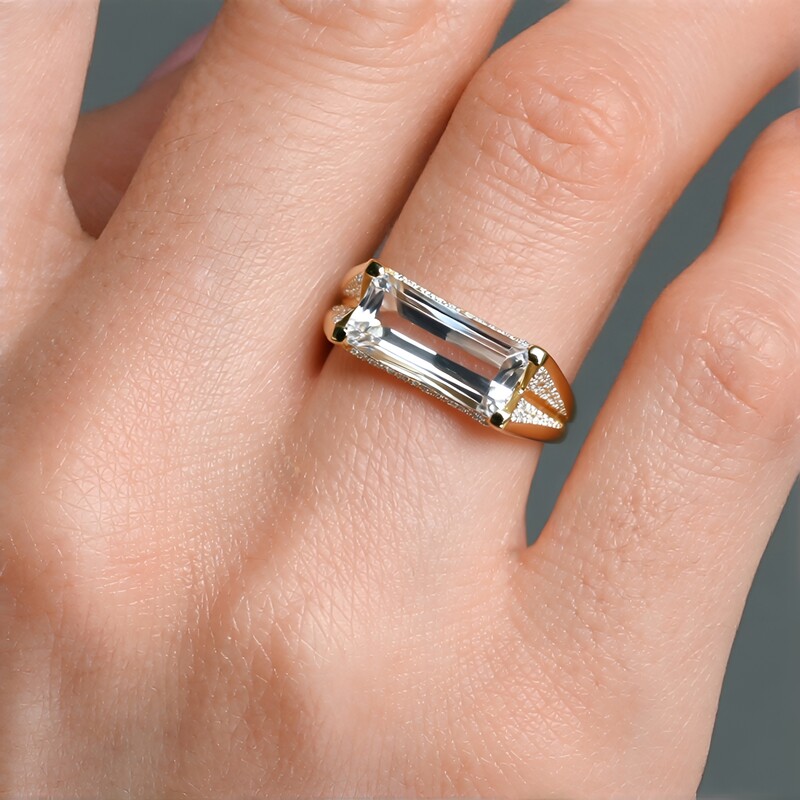 Gouden ring met een Meerkleurige Oekraïense Topaas (de Melo)