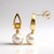 Orecchini in oro con Perla Bianca dei Mari del Sud (Michelle Albala)