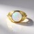 Anello in oro con Opale di Welo AAA (de Melo)