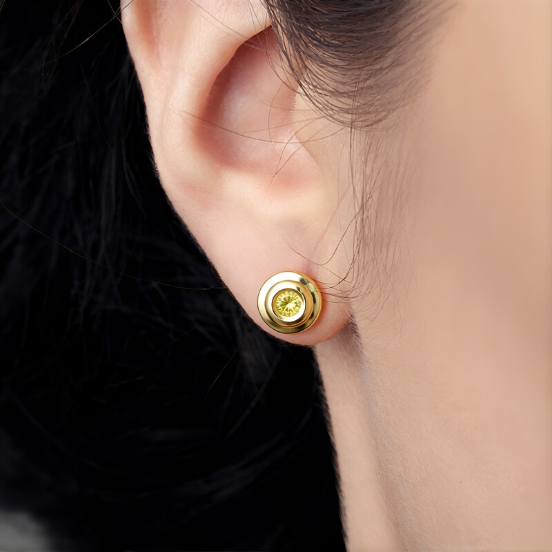 Orecchini in argento con Diamante Giallo I2