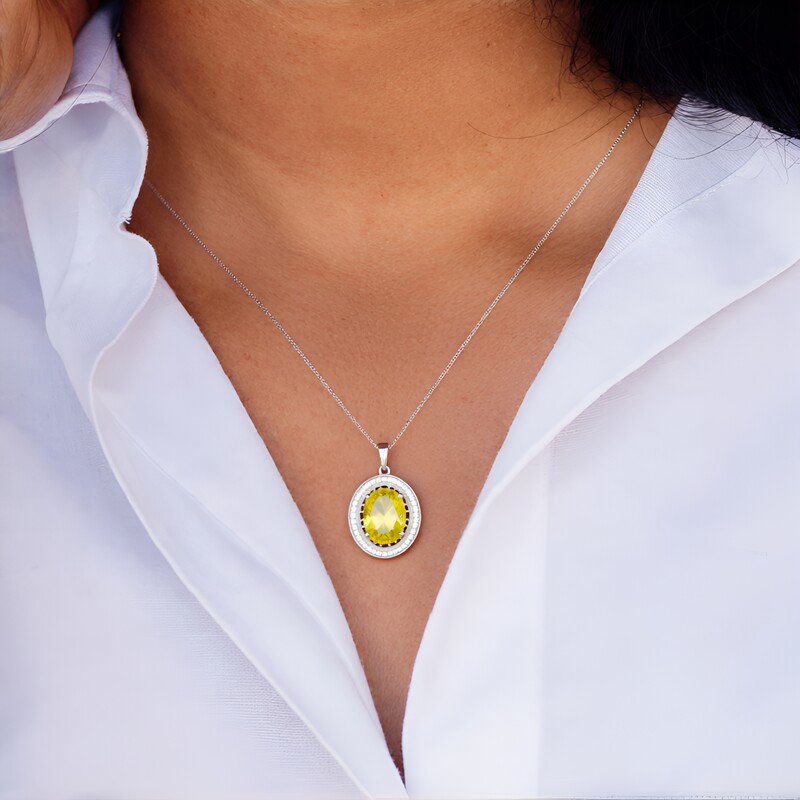 Zilveren hanger met een Ouro Verde kwarts