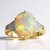 Anello in oro con Opale di Mintabie (AMAYANI)