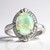 Anello in oro con Opale di Mintabie (AMAYANI)