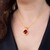 Zilveren halsketting met een rode andesien (Gems en Vogue)