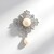 Broche en argent et Perle blanche de culture d'eau douce