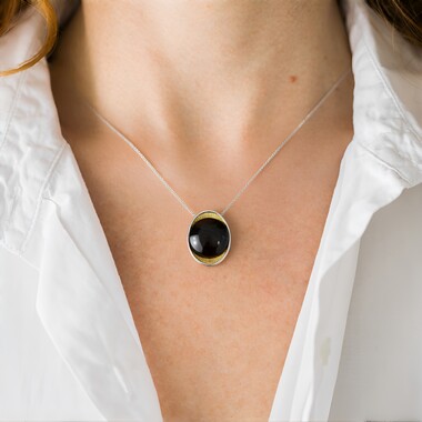 Colgante en plata con Madera de palma petrificada (dagen)