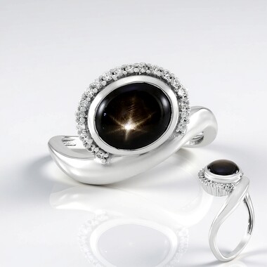 Zilveren ring met een zwarte ster saffier (de Melo Essence)