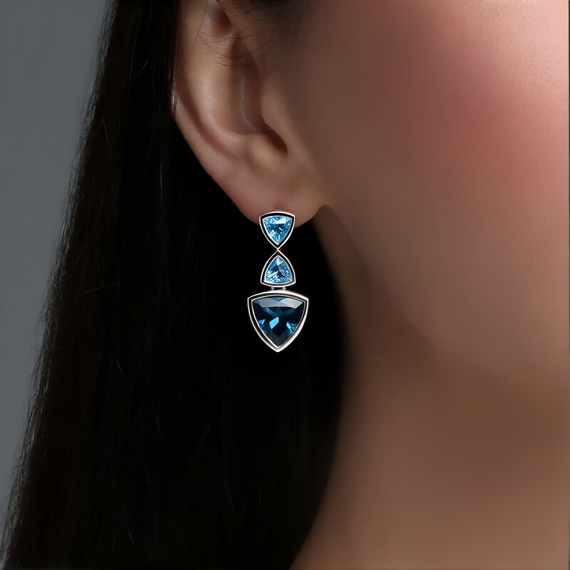 Kolczyki ze srebra rodowanego - Topaz niebieski London Blue (de Melo Essence)
