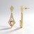 Orecchini in oro con Morganite Pesca AAA (de Melo)
