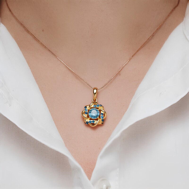 Gouden hanger met een hemel-blauwe I2 diamant (SUHANA)