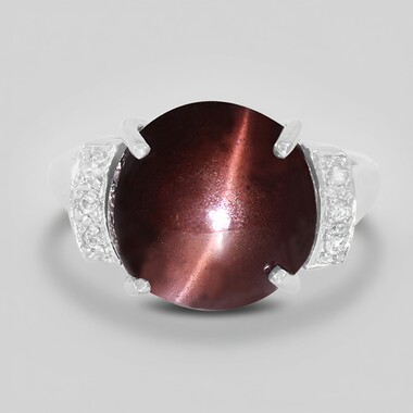 Anillo en plata con Escapolita ojo de gato