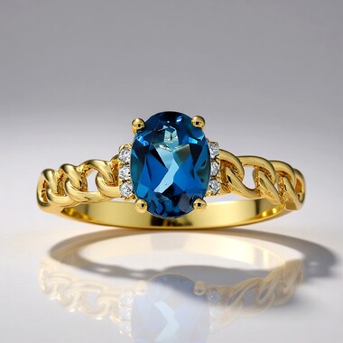 Anillo en oro con Topacio azul de Londres