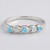 Anello in argento con Apatite Blu Neon e Zaffiro Bianco