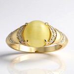 Anello in oro con Danburite gialla occhio di gatto (de Melo)