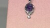 Zilveren hanger met een Charoite