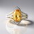 Anello in oro con Topazio Imperiale (SUHANA)