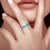 Zilveren ring met neon blauwe apatieten