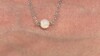 Zilveren halsketting met een Welo-opaal (de Melo Essence)