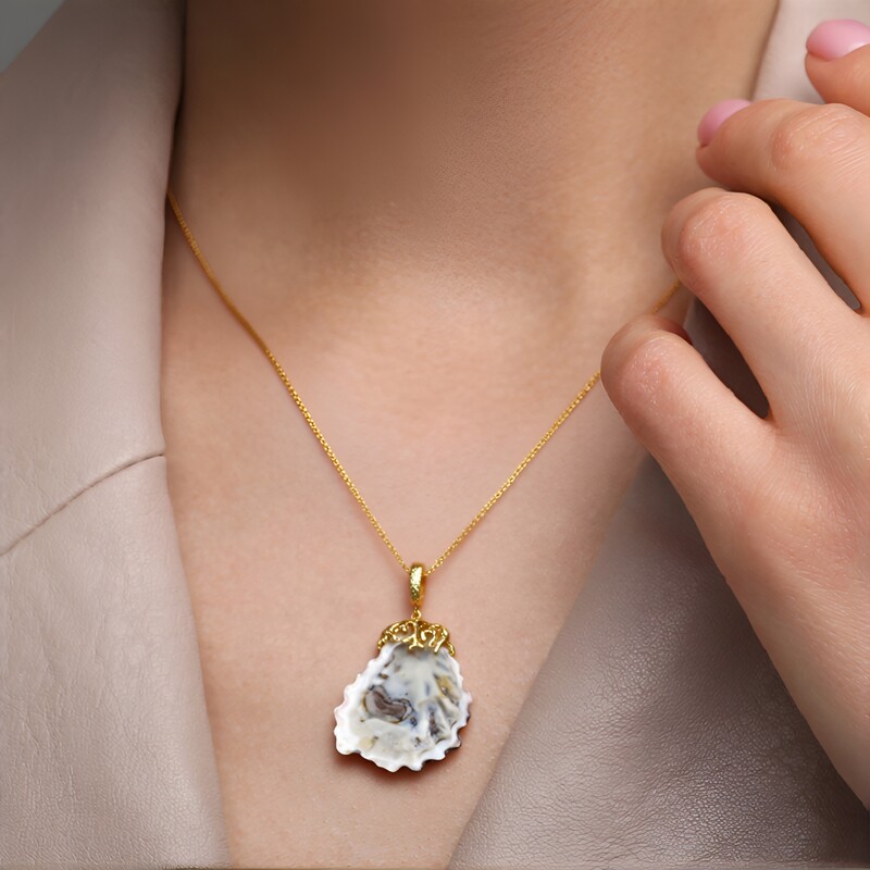 Zilveren hanger met een schelp (TPC)