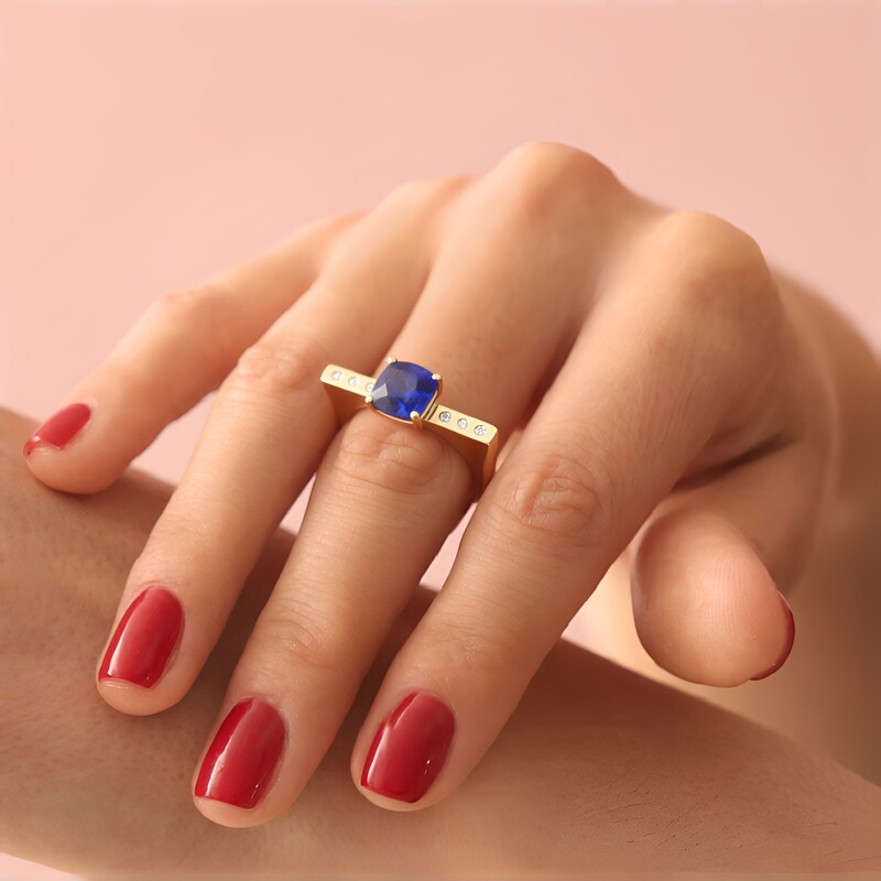 Gouden ring met een AAA tanzaniet (de Melo Gold)