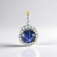 Zilveren hanger met een blauwe ster saffier
