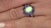 Gouden ring met een Australische opaal (CIRARI)