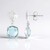 Boucles d'oreilles en argent et Topaze bleu ciel