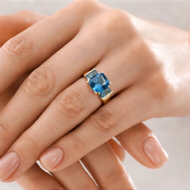 Pierścionek ze złota - Topaz niebieski London Blue