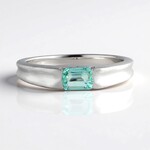 Bague en argent et Émeraude de couleur Paraiba