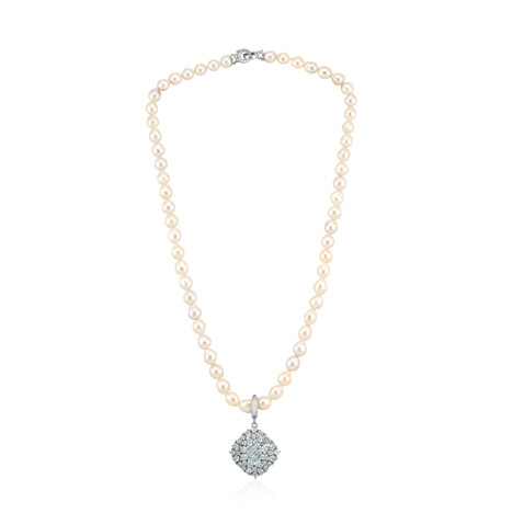 Zilveren halsketting met hemel-blauwe topaasstenen