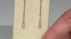 Gouden oorbellen met SI1 (H) Diamanten