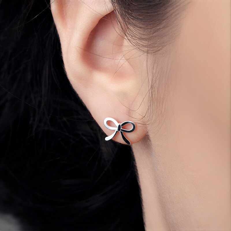 Zilveren oorbellen met witte topaasstenen