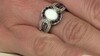 Gouden ring met een Australische opaal (CIRARI)