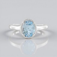 Zilveren ring met een hemel-blauwe topaas