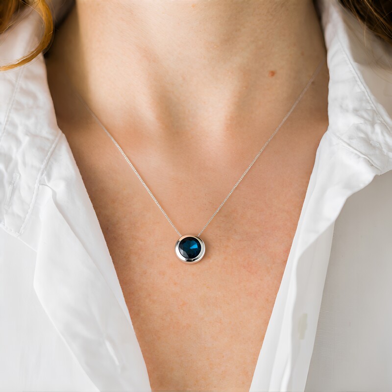 Zilveren hanger met een Londen-blauwe topaas (de Melo Essence)