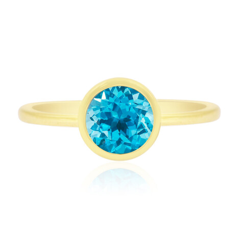 Anillo en oro con Topacio azul suizo
