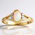 Anello in oro con Opale di Mintabie