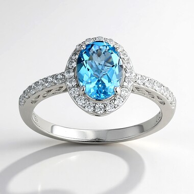 Pierścionek ze srebra rodowanego - Topaz niebieski Swiss Blue